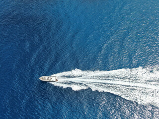 Obraz na płótnie Canvas yacht sailing in the blue sea. Concept of holidays, luxury a relax