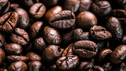 Freshly roasted coffee beans background.