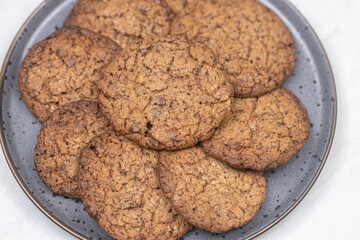 Preparing homemade chocolate round biscuit cookies