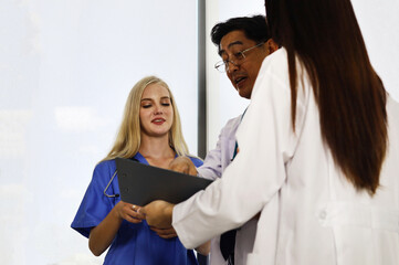 Fototapeta premium Happiness teamwork doctor talking and discuss in hospital.