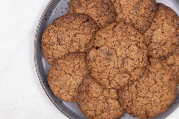 Preparing homemade chocolate round biscuit cookies