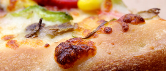 close-up slice of mixed pizza