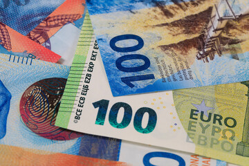 Paper money, Swiss francs and Euro banknotes