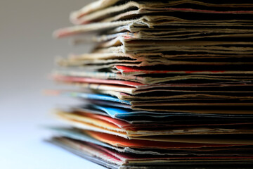 Pile of old vinyl singles in original sleeves
