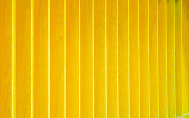 Yellow lath wooden wall, wall wooden lath