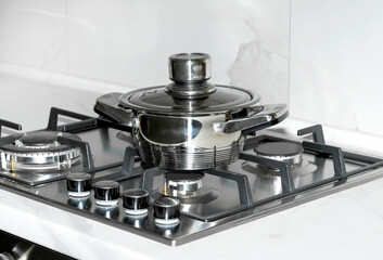 Boiling pot on the gas stove fire