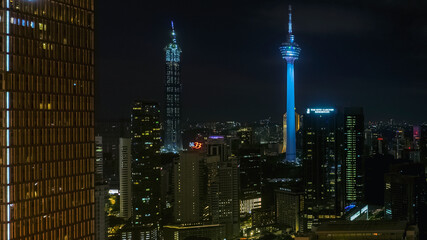 Fototapeta na wymiar Kuala Lumpur, Malaysia - April 02, 2021 : Blue hour over the Kuala Lumpur Tower from Malaysia. Image captured during dusk hour. Image will contains noise when zoom in actual size.