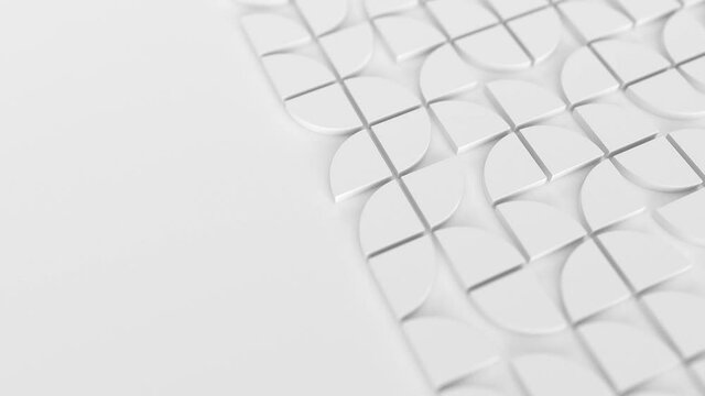 Modern white background with swiss styled semicircular 3d elements changing pattern. Minimal light background with shallow DOF.