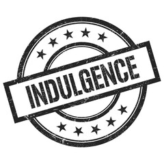 INDULGENCE text written on black vintage round stamp.