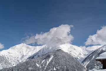 Fototapeta na wymiar Panoramic view the caucasus mountains of the ski resort Krasnaya Polyana, Sochi, Russia.