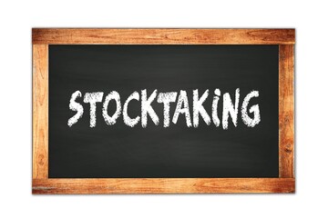 Obraz premium STOCKTAKING text written on wooden frame school blackboard.
