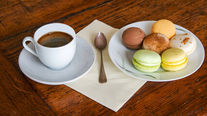 Delicious meringue with fillings and cup of coffee 