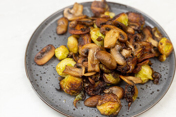 Cooked Brussel Sprouts with Mushrooms and served on the plate
