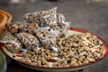 Peanuts and dried fruit are healthy snack food in rural Ghana, West Africa.