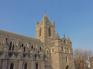 Fototapeta na wymiar Medieval gothic architecture of Christ Church Cathedral, Dulblin, Ireland on a sunny day with clear blue sky 