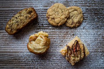 Fototapeta premium Christmas Holiday Dessert care pack with cookies, rice crispy treats, cupcakes, and banana nut bread