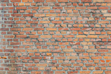 orange old brick background. Small bricks