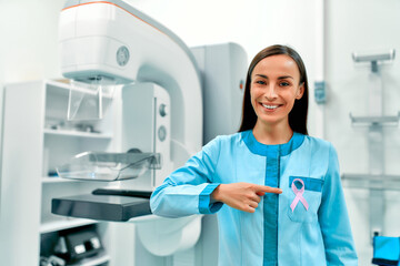 International symbol for October Breast Cancer Awareness Month. Female doctor with pink awareness...