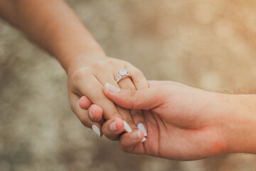 bride and groom holding hands