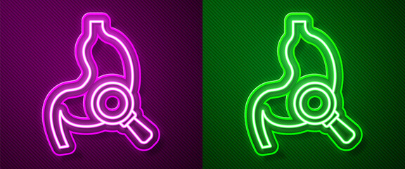 Fototapeta premium Glowing neon line Human stomach with magnifying glass icon isolated on purple and green background. Vector