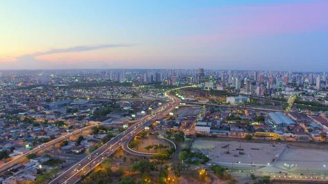 23 AERIAL IMAGE WITH CAMERA MOVEMENT OVER THE NEIGHBORHOOD OF JOANA BEZERRA, IN THE CITY OF RECIFE, WITH BUILDINGS AND THE FORUM IN THE BACKGROUND AT SUNSET