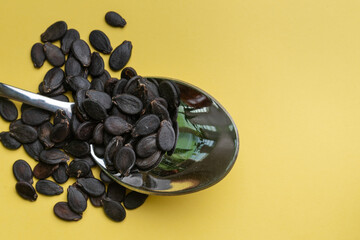 Watermelon seeds. Watermelon seeds on a yellow background