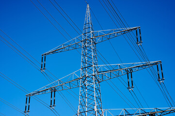 upper part of a power pole in front of the blue sky in Germany