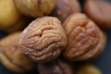 peeled chestnuts. rosted organic chestnuts. healthy snack. Seeds and nuts. Food ingredient. Healthy fats.