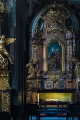 Obraz premium LVIV, UKRAINE - April, 2021: Saints Peter and Paul Garrison Church. Altar of the Apostles Peter and Paul with the sculpture 