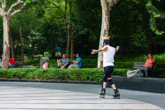 Middle-aged Roller Skater Showing Some Real Technique