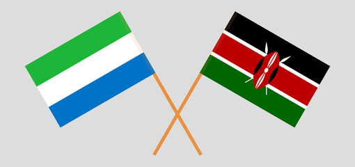 Crossed flags of Sierra Leone and Kenya. Official colors. Correct proportion