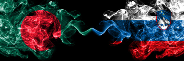 Bangladesh, Bangladeshi vs Slovenia, Slovenian smoky mystic flags placed side by side. Thick colored silky abstract smokes flags.