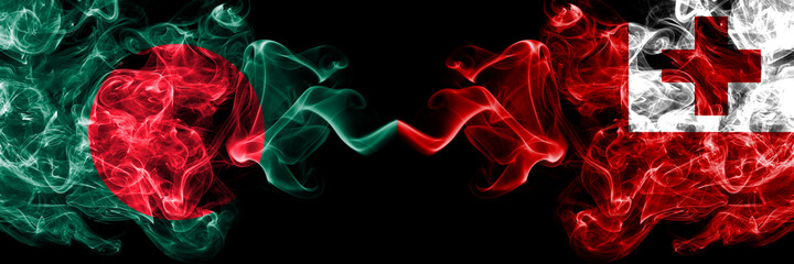 Bangladesh, Bangladeshi vs Tonga smoky mystic flags placed side by side. Thick colored silky abstract smokes flags.