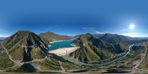 360VR panorama Blue lake surrounded by mountains and forest
