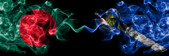 Bangladesh, Bangladeshi vs United States of America, America, US, USA, American, Las Vegas, Nevada smoky mystic flags placed side by side. Thick colored silky abstract smokes flags.