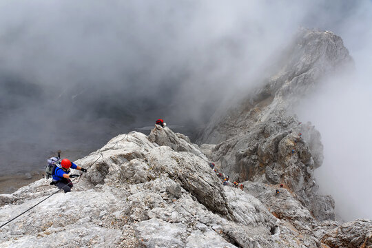 Alpinists on Koenigsjodler via ferrata, Austria, Europe