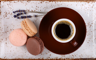 French macaroon cookies and cup of coffee
