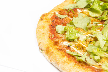Pizza with lettuce and chicken meat isolated above white background