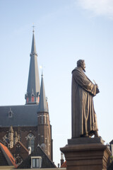 Fototapeta na wymiar Statue of Hugo de Groot on square in Delft (The Netherlands)