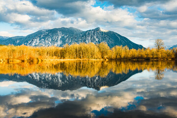 Mount Si in the Washington State Cascades reflects in Borst Lake on a winter evening