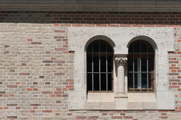 Arch windows in an old brick wall - closeup