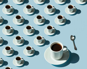 Rhythmic pattern from cups with coffee on a blue background.