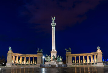 Hungary, heroes square in Budapest against the background of the evening sky, night city lights