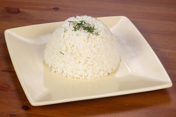 Fototapeta na wymiar Steamed rice in the plate