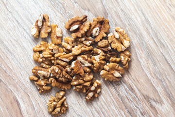 Group of walnuts on brown background
