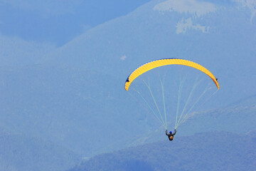 Paragliding in the mountains - extreme sports