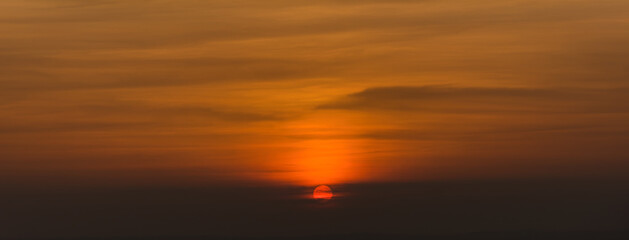Ultra wide panorama of evening sunset.