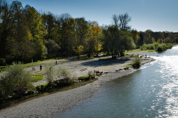 Isar river near Munich. A favorite resting place for the townspeople. Bavaria, Germany.