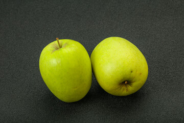 Two ripe green sweet apples