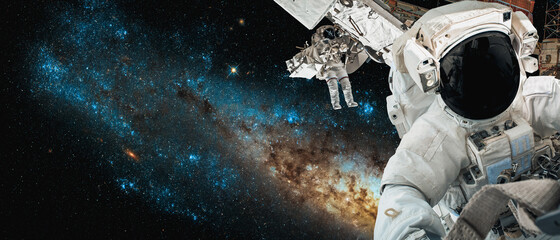 Astronaut spaceman do spacewalk while working for space station in outer space . Astronaut wear full spacesuit for space operation . Elements of this image furnished by NASA space astronaut photos.
